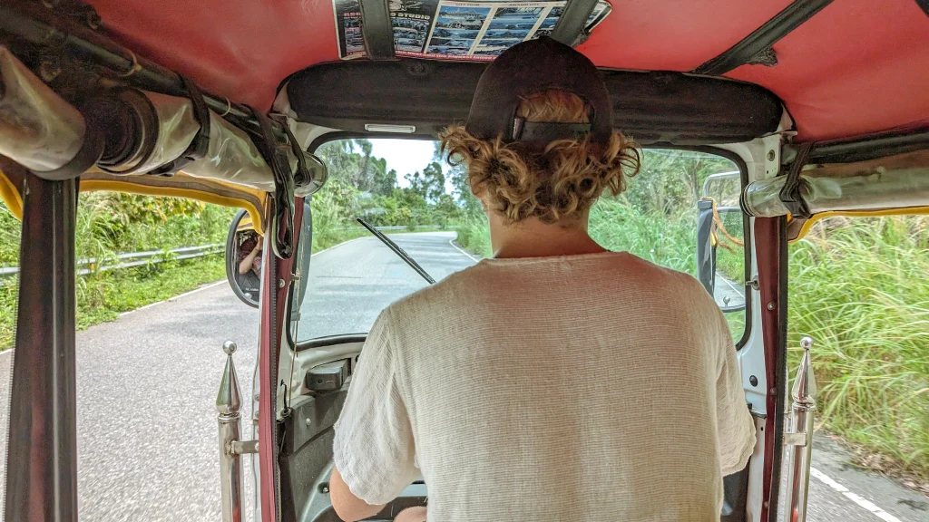 driving a tuktuk-in cambodia inside picture