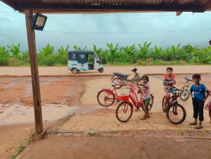 tuktuk next to Cambodian locals