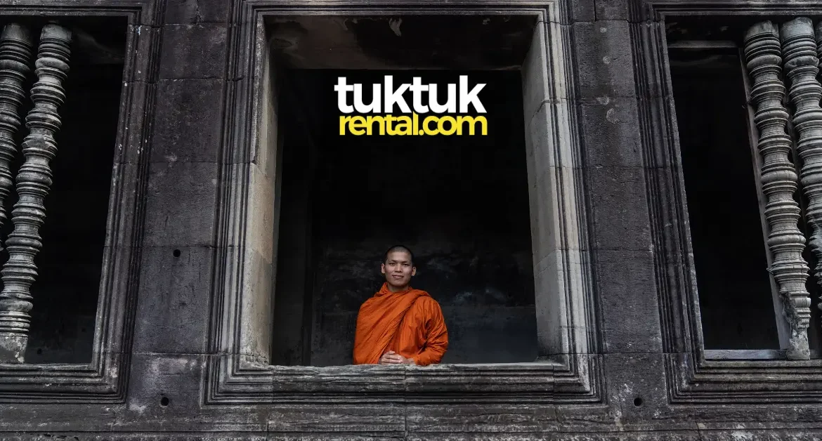 Buddhist monk standing in ancient temple window.