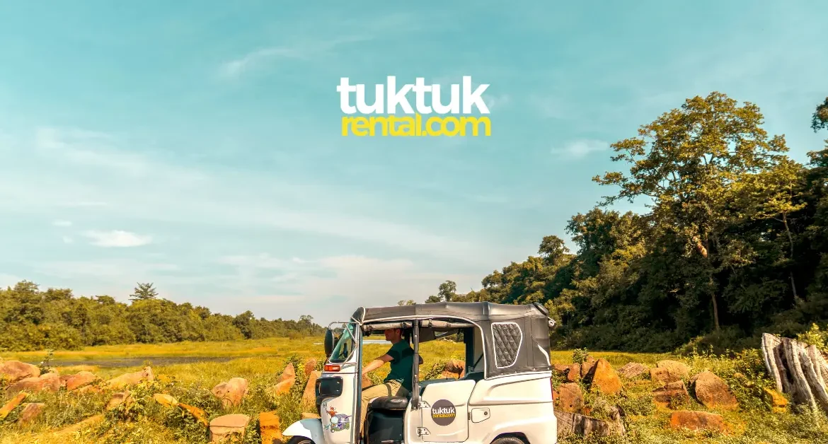 White tuk-tuk driving