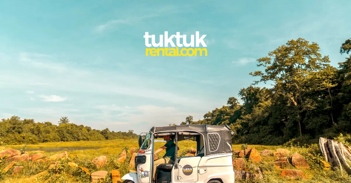 White tuk-tuk driving