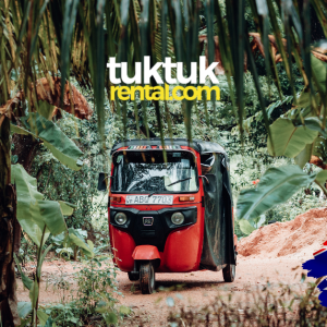 A red tuk-tuk with a logo, likely in Australia.