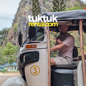 A tuk-tuk in Cambodia with friends.