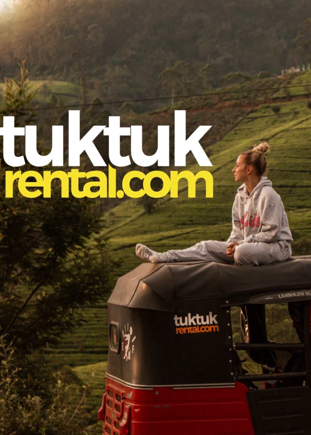 Two women are sitting on top of a tuk-tuk.